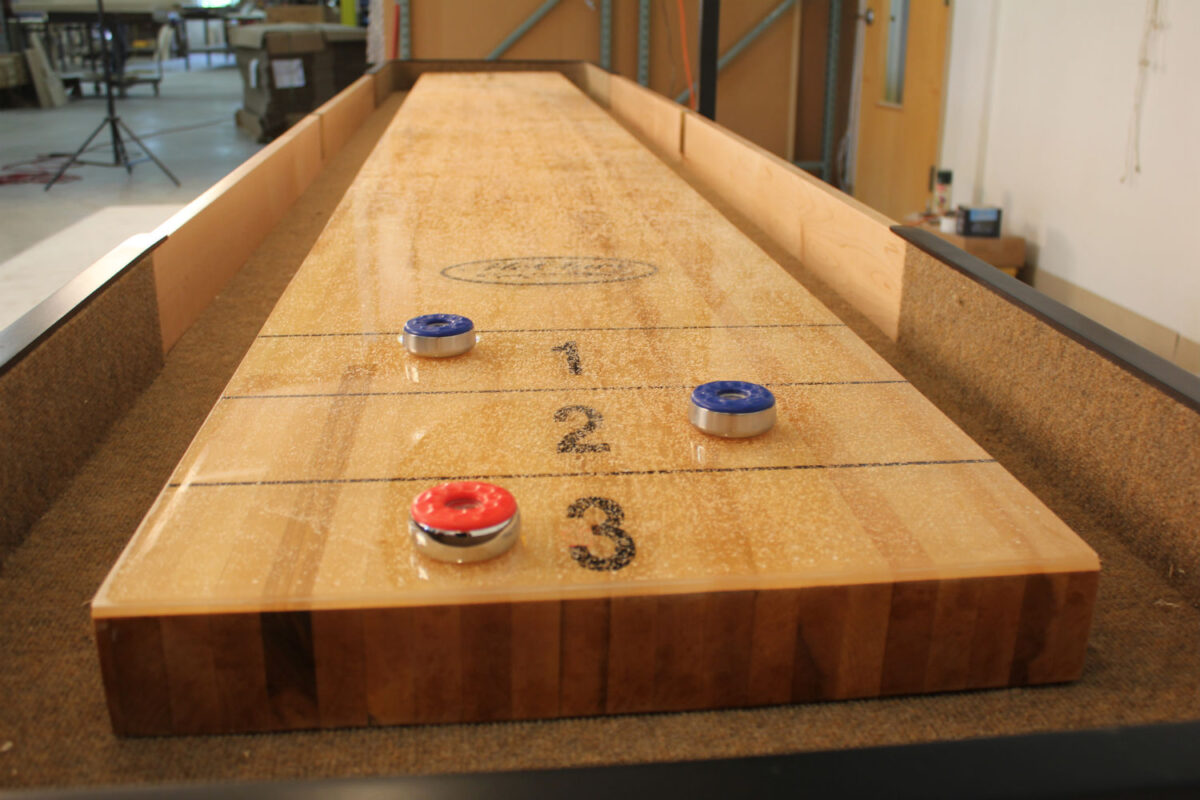 How to Spread Sand on a Shuffleboard Table